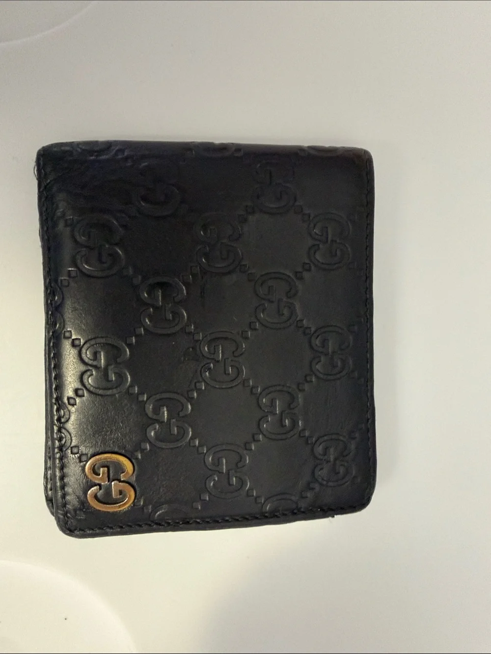 Gucci Black Embossed Interlocking G Leather Bi-Fold Wallet